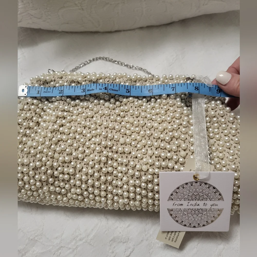 Elegant Cream Beaded Clutch with Curved Frame - Picture 9 of 15